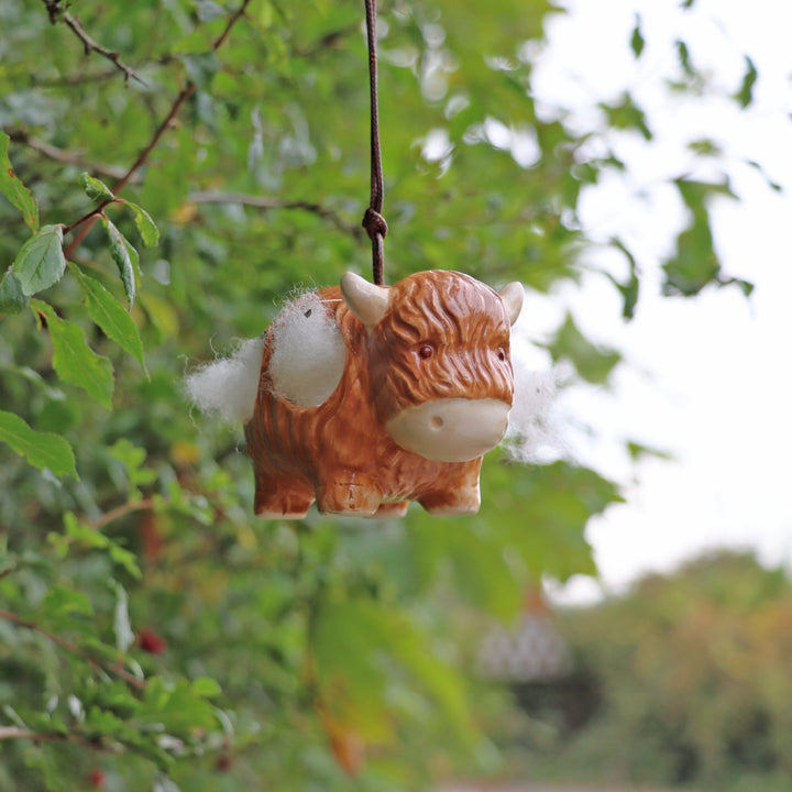 'Hairie' Hanging Ceramic Highland Cow With Nesting Wool