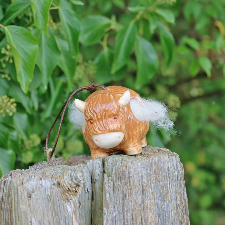 'Hairie' Hanging Ceramic Highland Cow With Nesting Wool