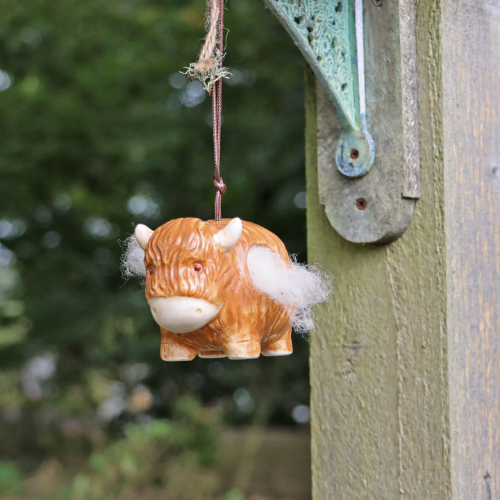 'Hairie' Hanging Ceramic Highland Cow With Nesting Wool