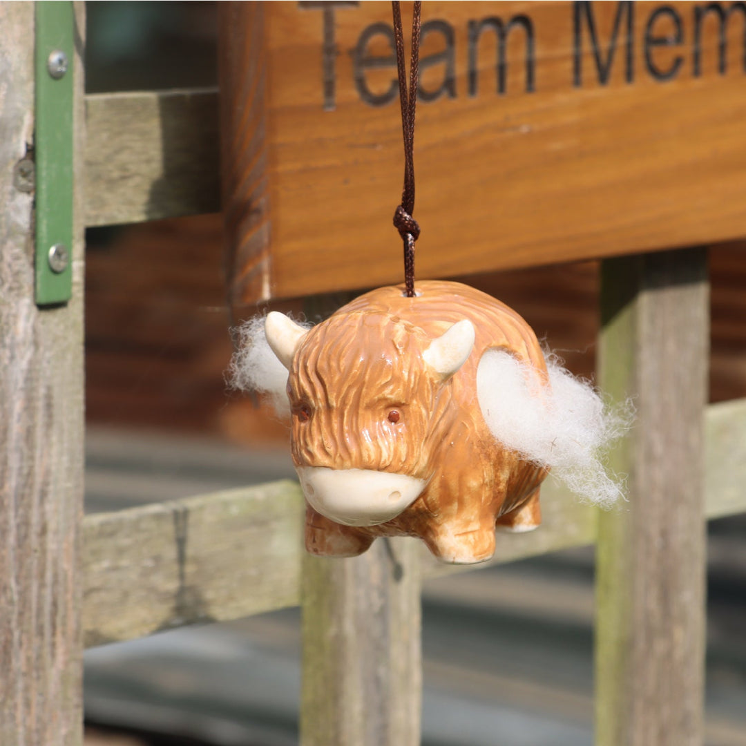 'Hairie' Hanging Ceramic Highland Cow With Nesting Wool