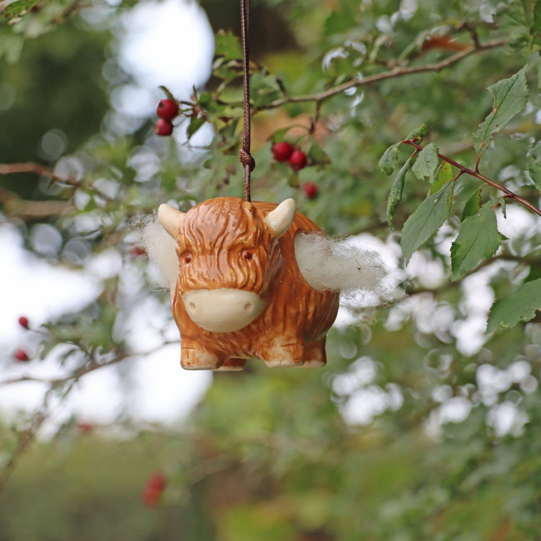 'Hairie' Hanging Ceramic Highland Cow With Nesting Wool