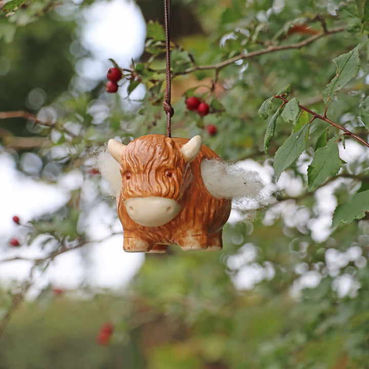 'Hairie' Hanging Ceramic Highland Cow With Nesting Wool