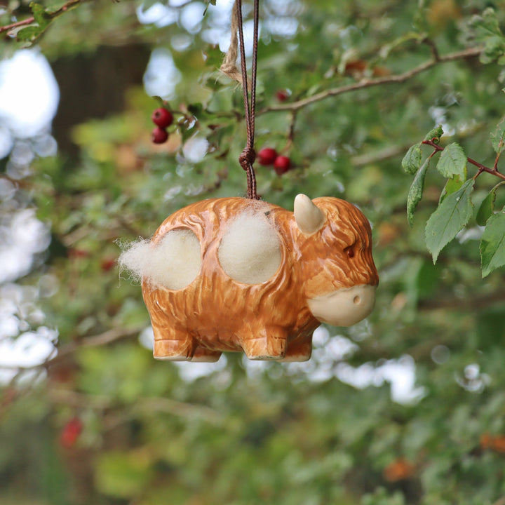 'Hairie' Hanging Ceramic Highland Cow With Nesting Wool