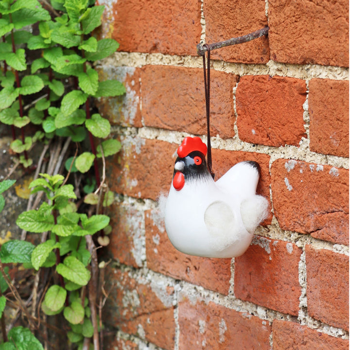 'Cluckie' Hanging Ceramic Hen With Nesting Wool