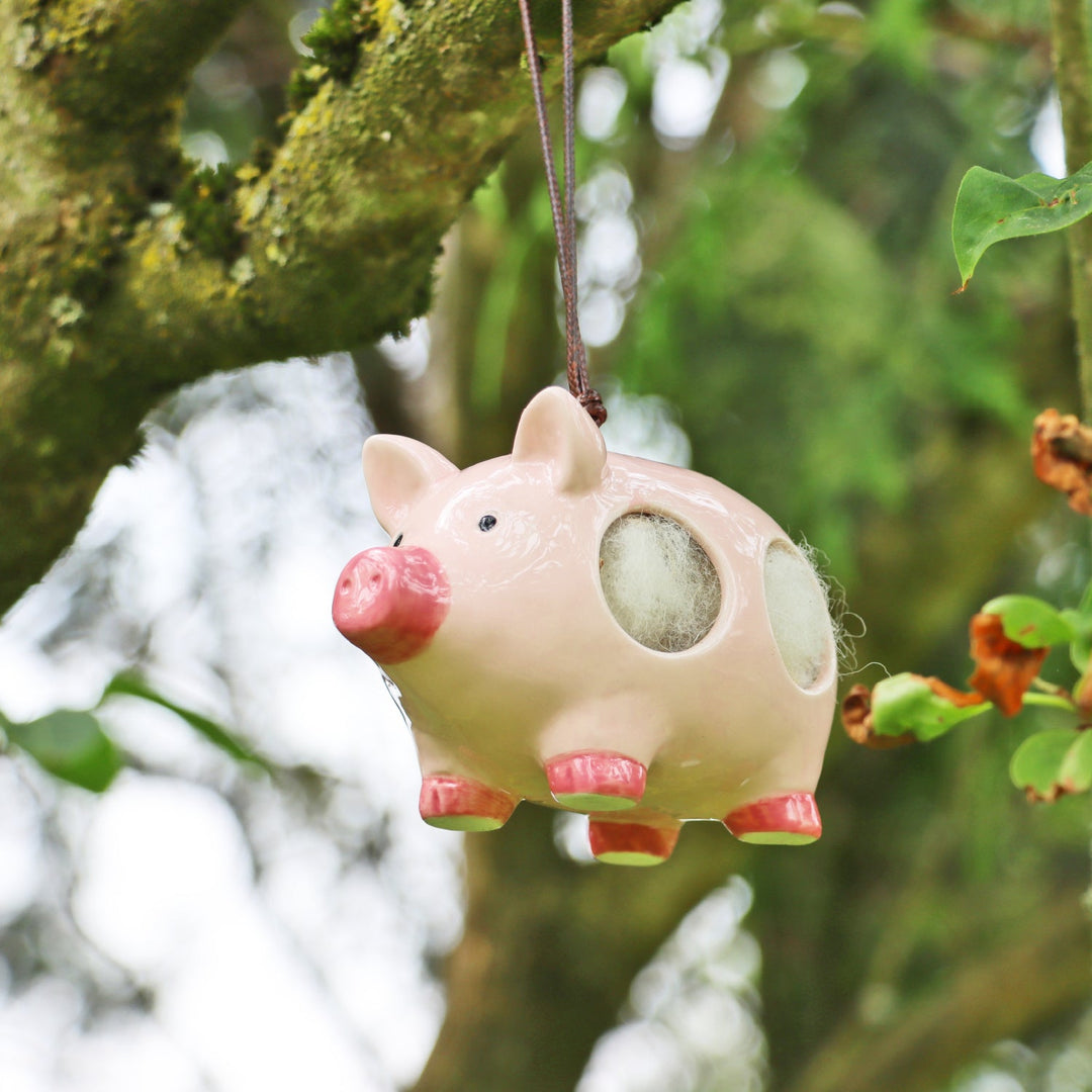 'Curlie' Hanging Ceramic Pig With Nesting Wool